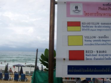 Karon, the Phuket beach where nobody reads the signs or sees the flags
