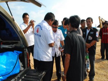 The jet-ski rider's body is loaded into an ambulance on Phuket today
