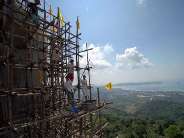 Phuketwan's view from a crane of Big Buddha's face during construction