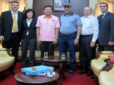 Project officials greet Phuket Governor Tri Augkaradacha today