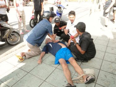 A man is treated after collapsing in Patong during the emergency