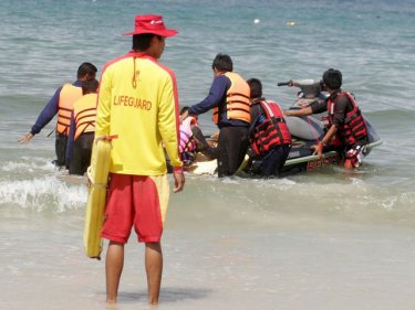 A jet-ski equipped with a sled brings a Phuket ''tourist'' safely ashore