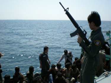 Rohingya boatpeople under the gun in Thailand in 2009