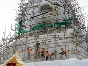 Workers give Phuket's Big Buddha a holiday makeover yesterday