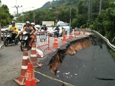 There goes the neighborhood: holey moley on Patong Hill, October 2011