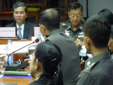 Colonel Ngo Minh Chau (left) meets Phuket police in Phuket City today