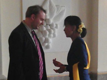 Andy Hall briefs Aung San Suu Kyi in December about Thailand's labor crisis