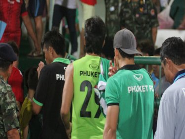 Phuket players are allowed to file off after the fans staged a protest