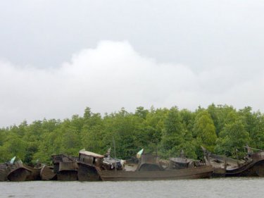 A graveyard for Rohingya boats in Phang Nga, Thailand, pictured in 2008. Thousands stream south looking for sanctuary and find smugglers instead