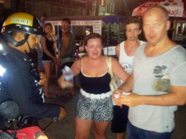 Troubled tourists with police in Patong early today