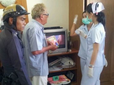 Hans Lehner helps police and nurses with inquiries in Patong today