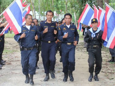 Royal Forest rangers parade through at-threat parkland on Phuket