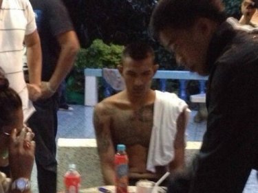 Confessed gunman  Narongsak Sealim after his arrest on Phuket tonight