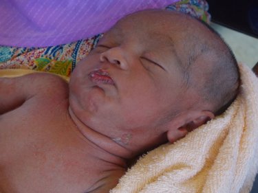 On the run: Baby born at sea Muhamad Hamid at a shelter in February