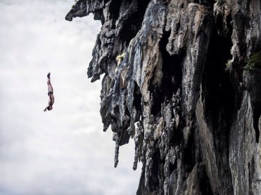David Colturi  dives from a 25 meter rock at Viking Caves on Phi Phi during the 2013 Red Bull Cliff Diving World Series yesterday