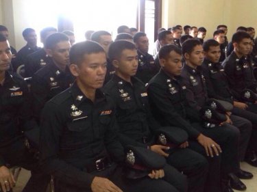 New Phuket policemen listen to the commander on arrival yesterday