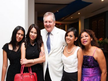 Honorary consul Claude de Crissey with guests at the party