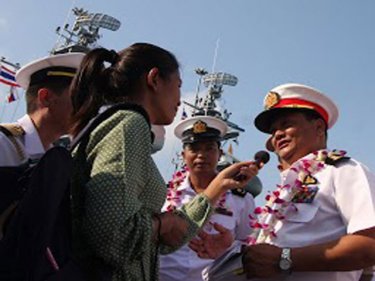 Reporter Chutima  interviews a Burmese Navy captain in February on Phuket during a historic visit by the Burmese Navy to the Royal Thai Navy