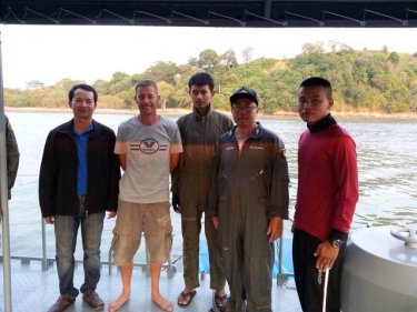 Nicholas Byham with his rescuers off Krabi and Phuket yesterday