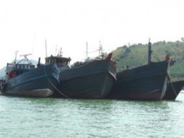 The three large vessels seized today, with a smaller boat in Ranong