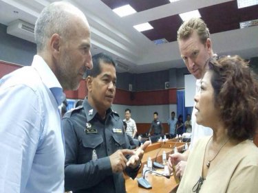 Eric Francelet (left) with the deputation at Phuket Police Headquarters yesterday