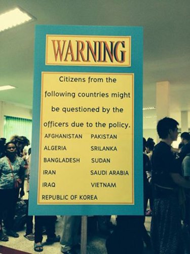 A discriminatory sign goes at a Thai border crossing from Cambodia