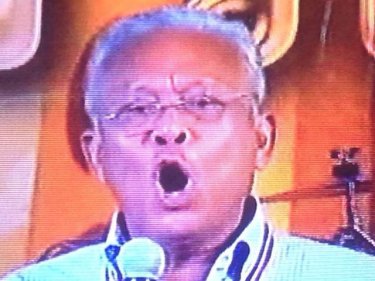 Suthep Thaugsuban on television tonight, calling for a summit tomorrow