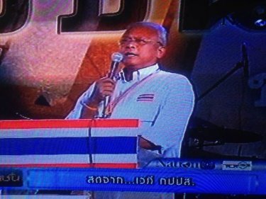 Protest leader Suthep Thaugsuban on stage in Bangkok as usual last night