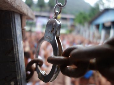 Thousands of prisoners cram into the Phuket jail's central  quadrangle