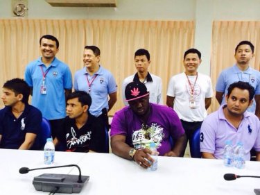 Some of the arrested men at Phuket Immigration HQ today