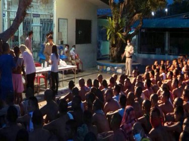 The packed quadrangle of Phuket Prison before dawn today