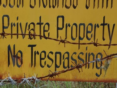 A ''Private Property'' sign on land near Phuket's Sirinath National Park