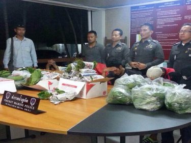 Marine Police with the large Post Office parcel haul of kratom yesterday