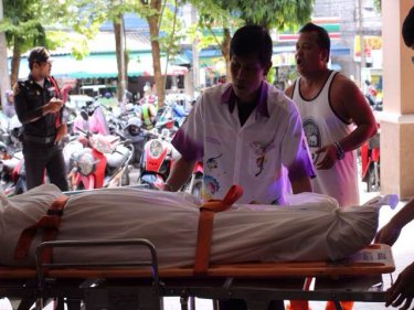 One of the boy's family with his body at Vachira Phuket Hospital