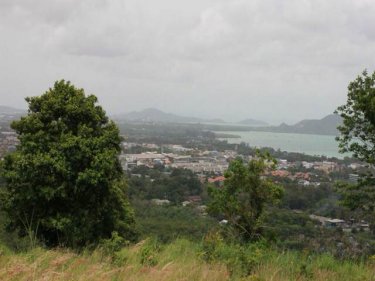 The view from the illegal road and traverse carved on a Phuket hill