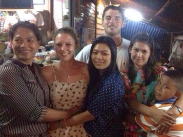 The reunion: Ben and Emily greet Khun Yupin with friends