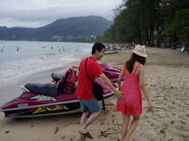 First you see them: Patong's jet-skis have moved under the trees