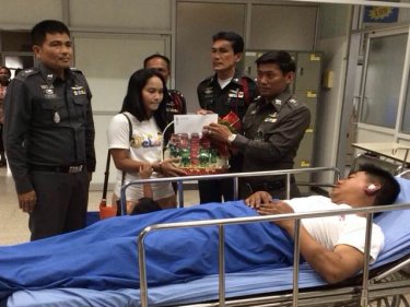 The injured policeman recovering in hospital this afternoon