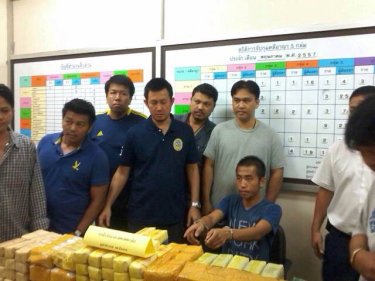Police with Somboon Seawang and the large Ranong drugs haul