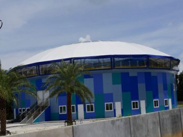 The Phuket Dolphinarium appears to be complete behind metal screening