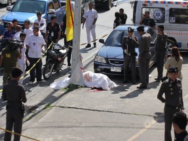 The scene of the shooting in Phuket City today, with a manhunt underway