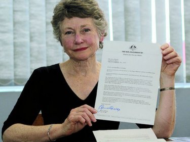 Jenny Braddy with a letter from Canberra about her brother's case