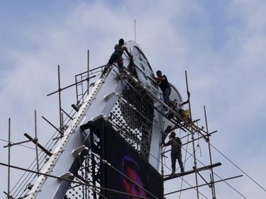 No sign of safety-first: four workers at heady heights at Boat Lagoon yesterday