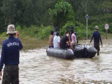 Navy sailors help Phuket residents cope with flood conditions today