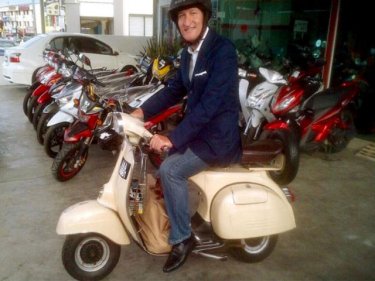 Marco Battistotti, 49, the Skal Asia President, on a Vespa scooter