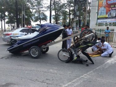 A man was ferried by ambulance to hospital after a jet-ski crash today
