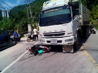 The bike under the truck at Kamala, both women escaped with their lives