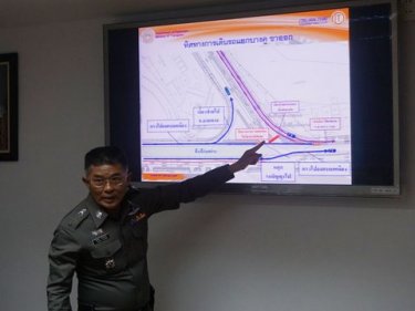 Police explain the plan for diverting traffic at the bypass intersection