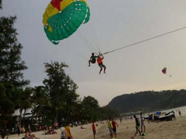 Flying feet, more of a danger than sharks or jellyfish at Patong beach