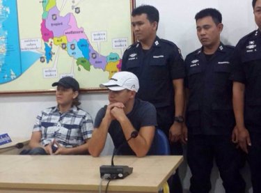The Russian pair after arrest on Phuket, now facing deportation